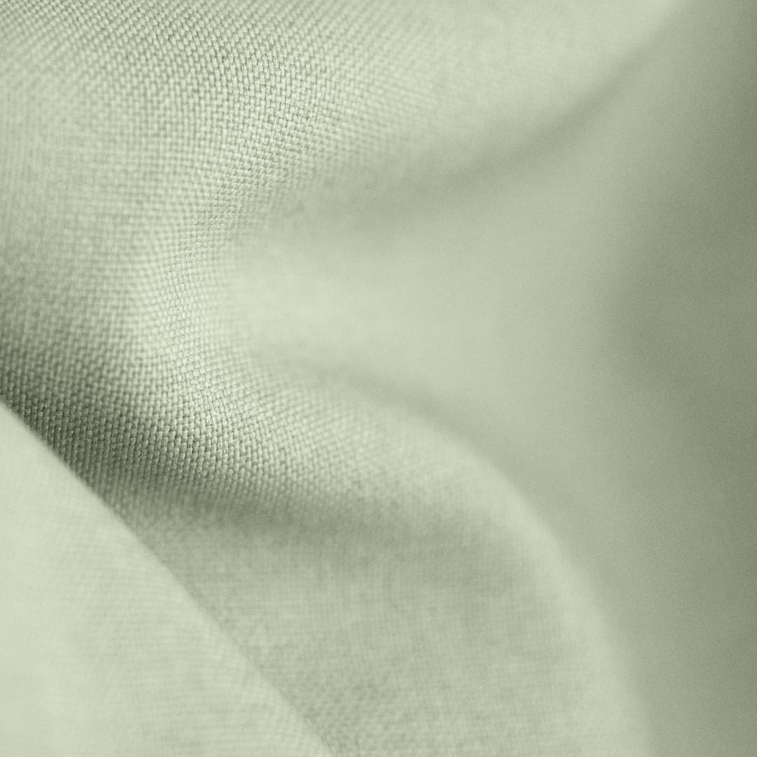 Soft brushed woven in light green from BabyBjörn